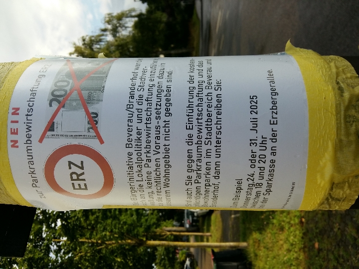 sign on lamp post